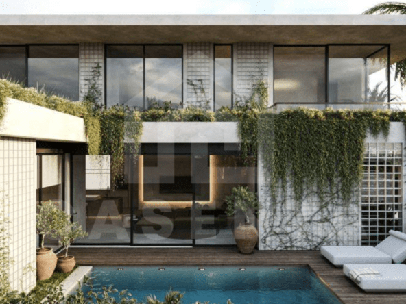 3 bedroom villa for sale in Sanur with stylish design. Pool and outdoor deck with sun loungers. Modern exterior