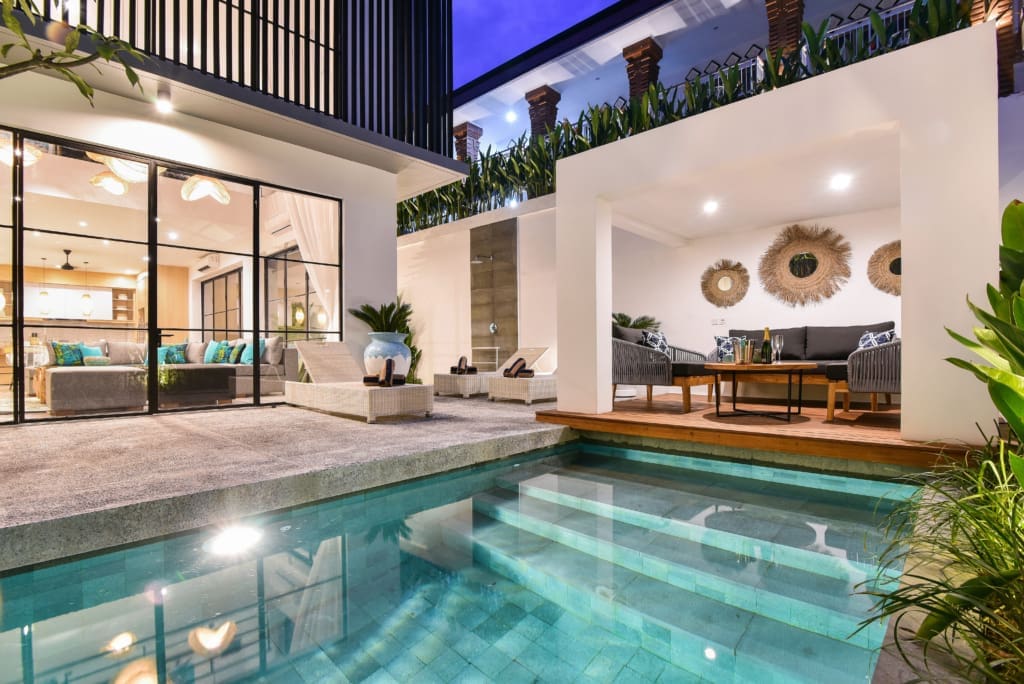 Modern exterior of a 4 bedroom villa in Bali for Sale. High ROI investment property with stylish decor and large pool