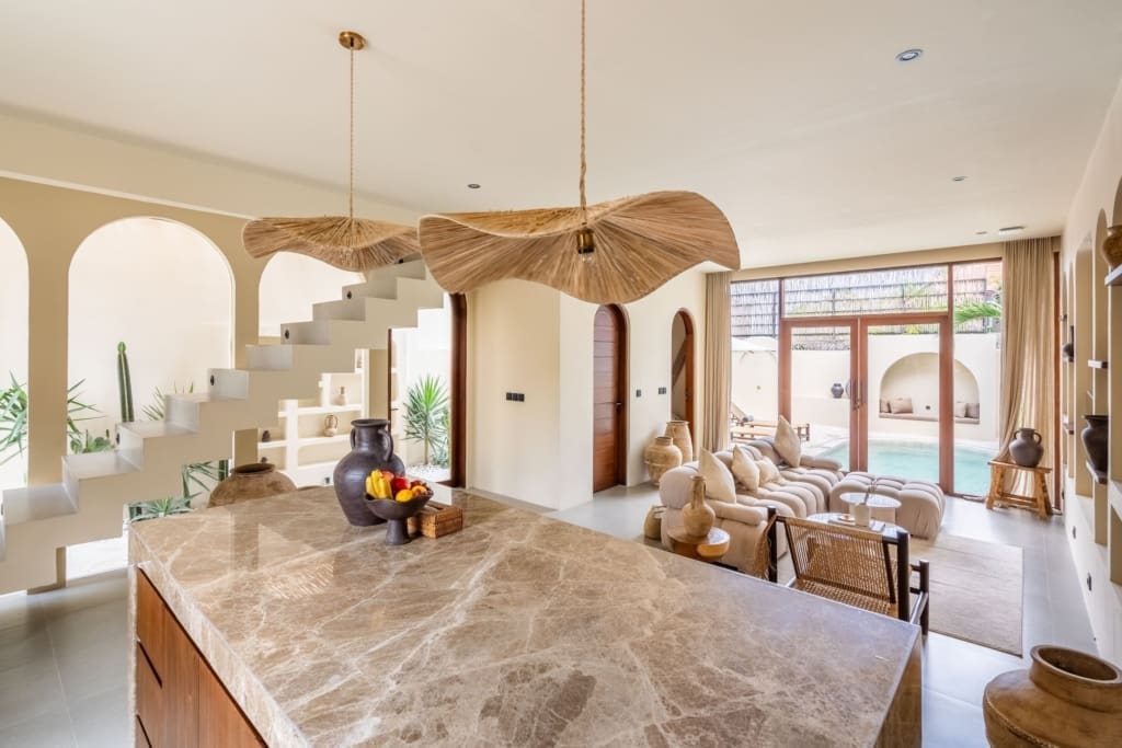 Open-plan kitchen and living room in a modern Mediterranean villa investment in Bali