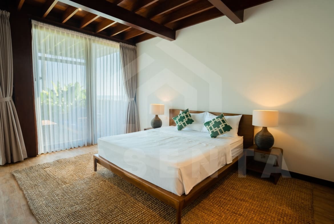 Comfortable bedroom inside tropical villas in Tabanan coastline