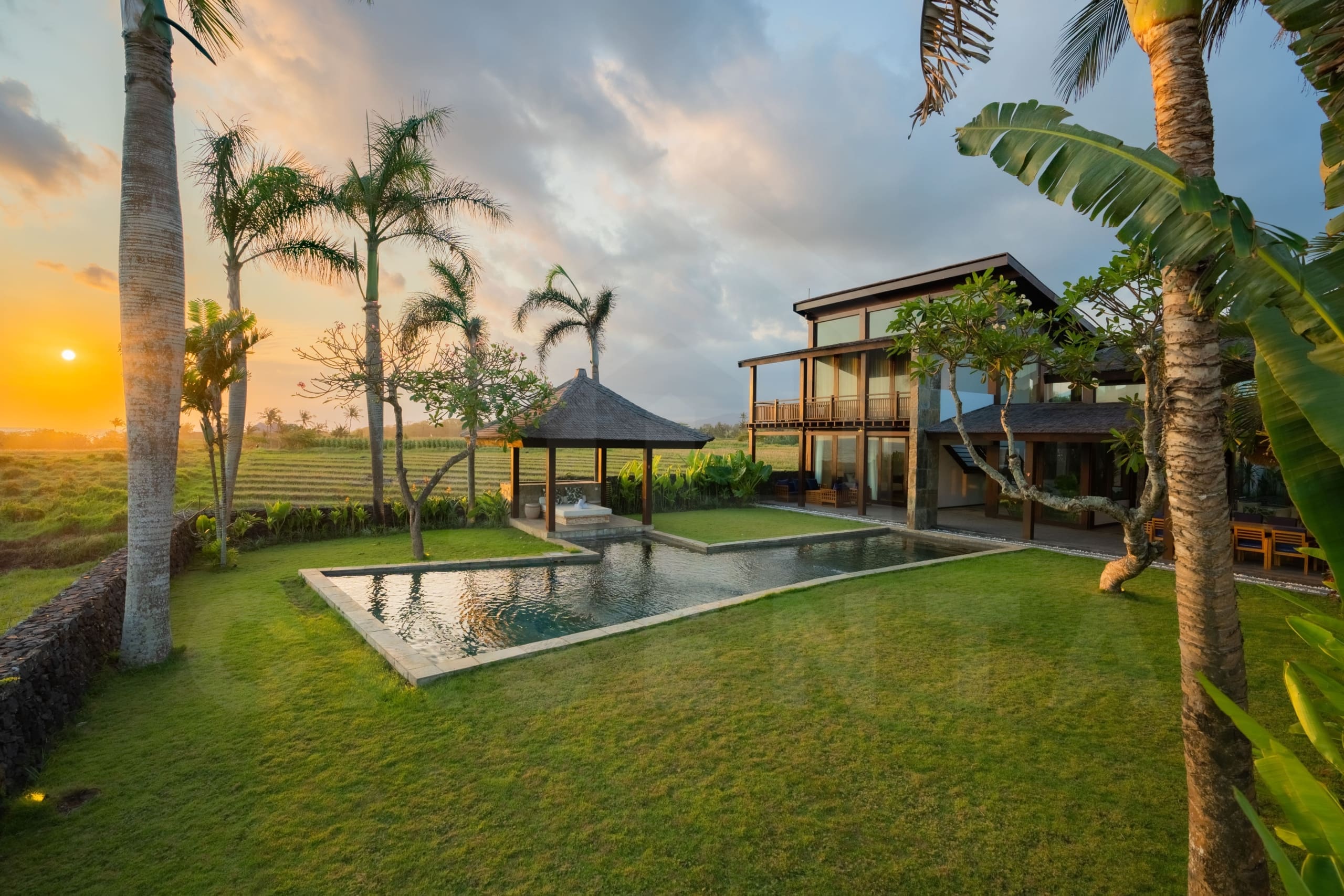 Spacious lawn inside tropical villas in Tabanan coastline