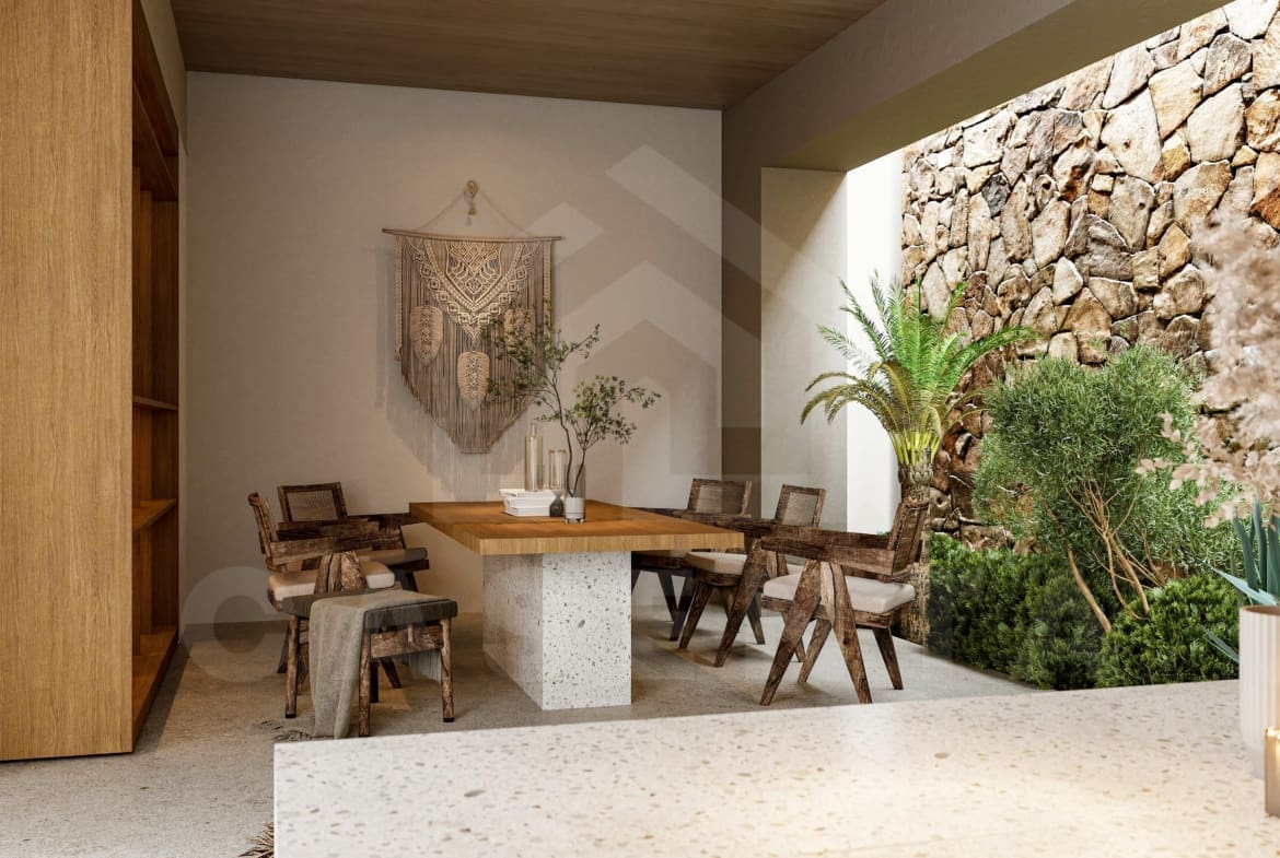 Wood and stone dining table inside a beautiful 2 bedroom villa in Bingin
